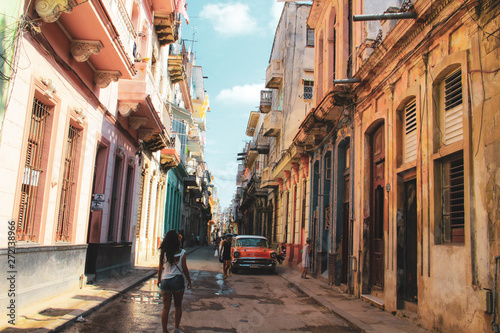 Colorful street and old car in Havana, Cuba