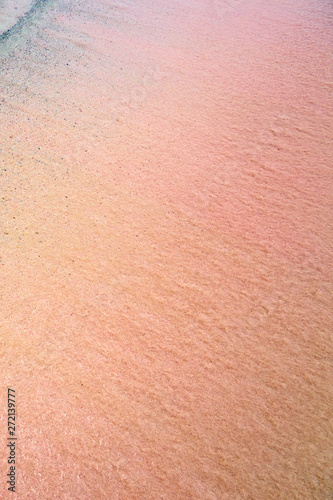 Colorful sand on tropic beach. Copy space. 