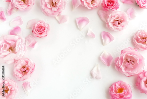 Fototapeta Naklejka Na Ścianę i Meble -  Flowers composition background. beautiful pale pink roses pattern on white  background.Top view.Copy space