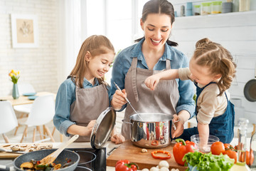 Happy family in the kitchen.