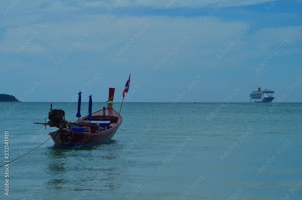 Boat in the sea at dawn Boat in the sea at dawn