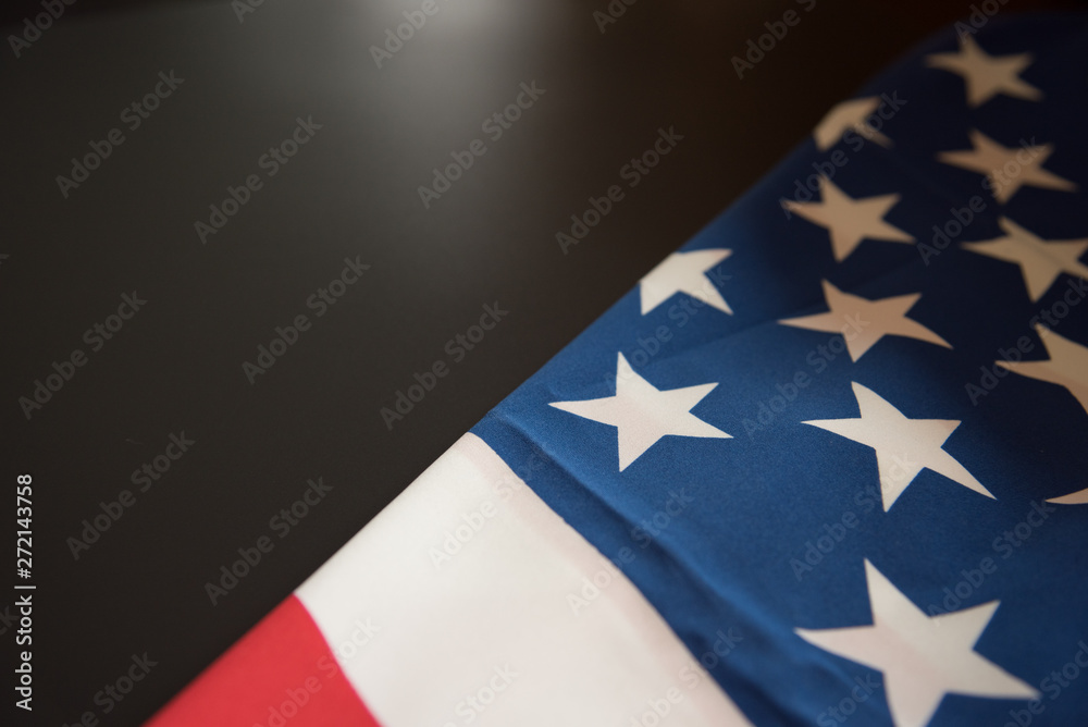 American flag close up in dark background with copy space
