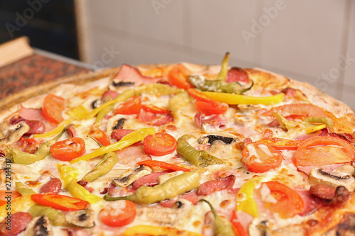 Delicious pizza on table, closeup. Fresh from oven