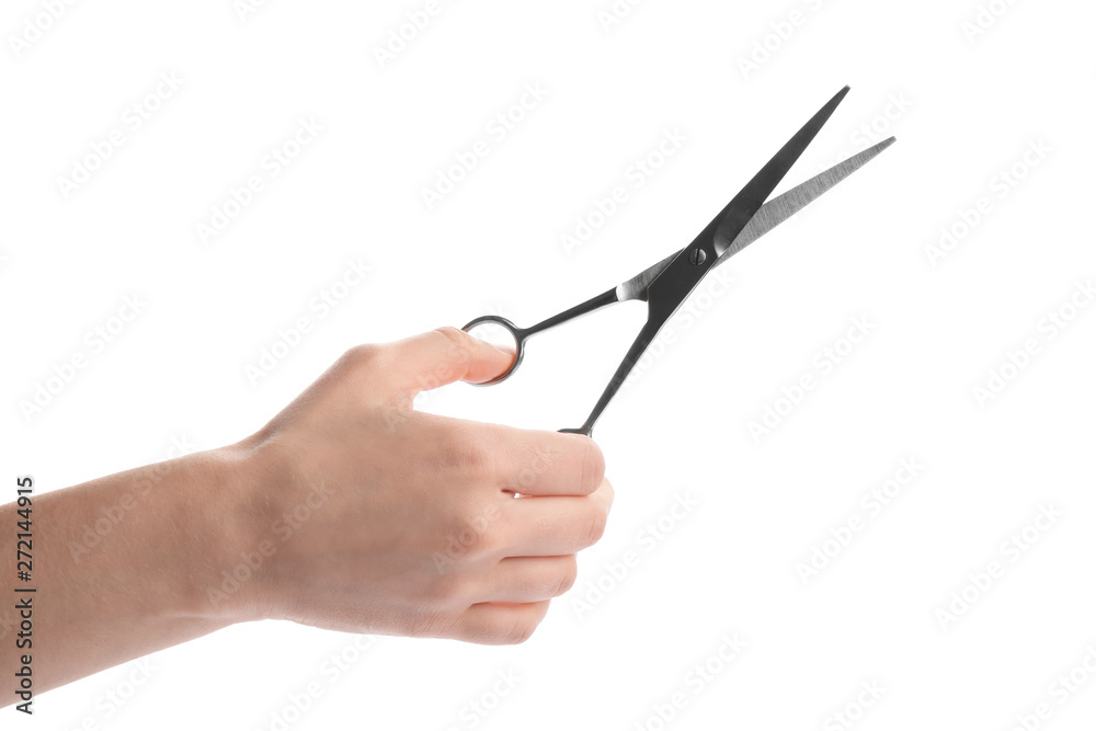 Woman holding hairdresser's scissors on white background, closeup Woman holding hairdresser's scissors on white background, closeup