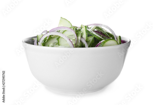 Fresh tasty salad with cucumber in bowl on white background