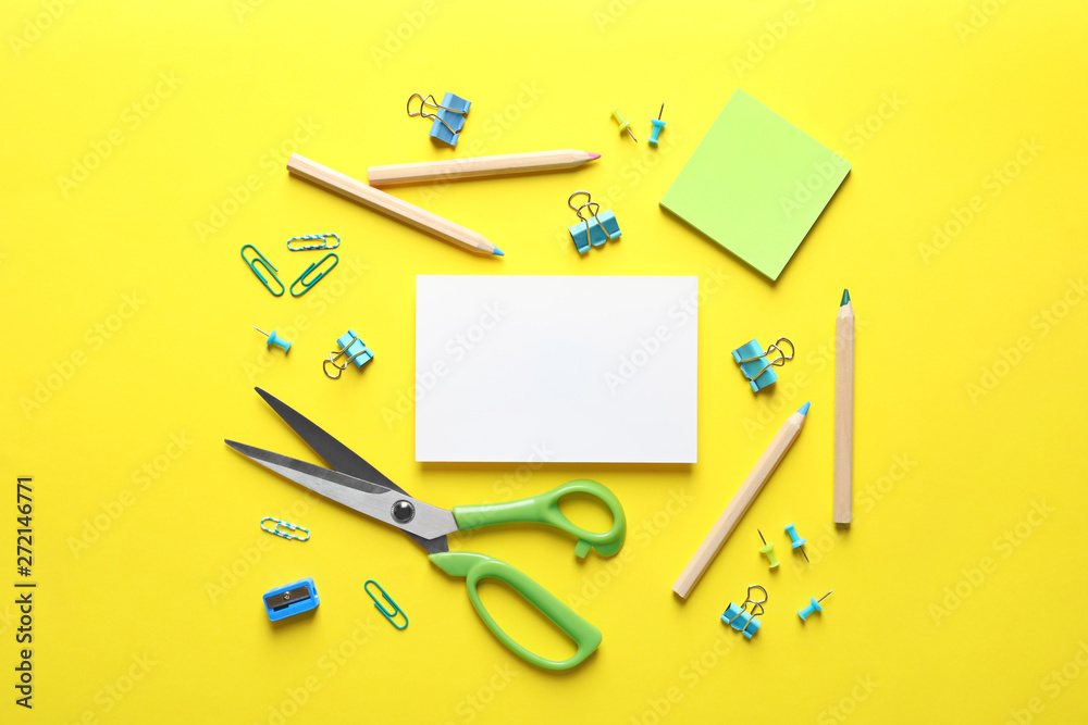Flat lay composition with scissors and office supplies on color background. Space for text Flat lay composition with scissors and office supplies on color background. Space for text