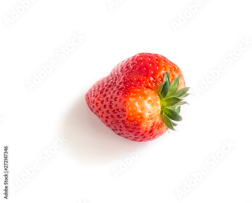 Red ripe strawberry with shadow on white background