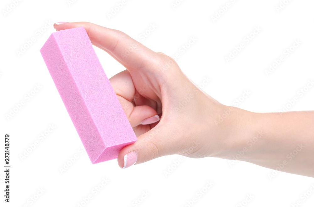 Female hand manicure nail buff on white background isolation Female hand manicure nail buff on white background isolation