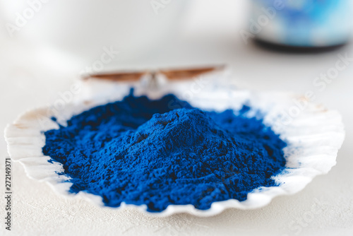 Blue Spirulina algae powder, healthy dietary supplement. photo