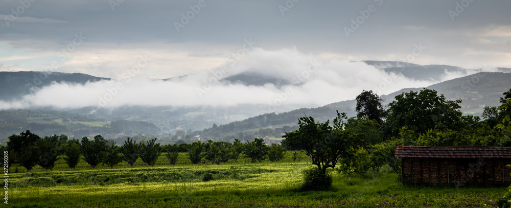 Village landscape, cloudy rain day. Village Gruza near the Kragujevac.