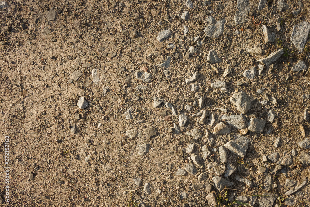 Ground road with fine gravel View from the top. Close-up Background