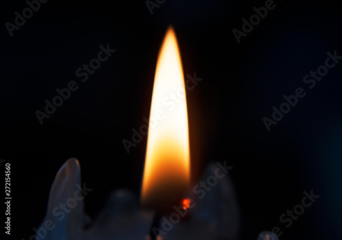 Just a burning candle in the dark.