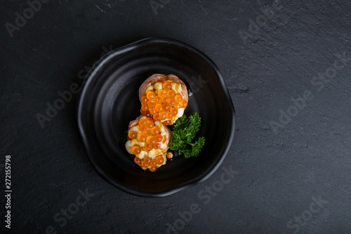 Creative Japanese food.It my neam Salmon Grilled roe ball.Add salmon roe and mayonnaise sauce.Large salmon roe on photo