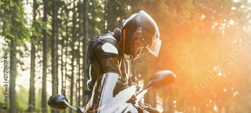 motorbike on the road riding. having fun riding the empty road on a motorcycle tour / journey