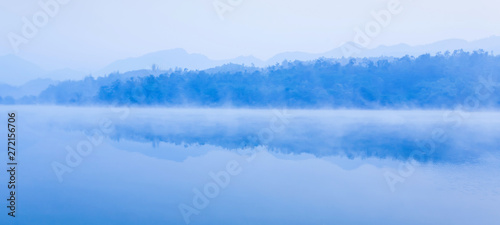 Panoramic scenery of lake on winter morning.