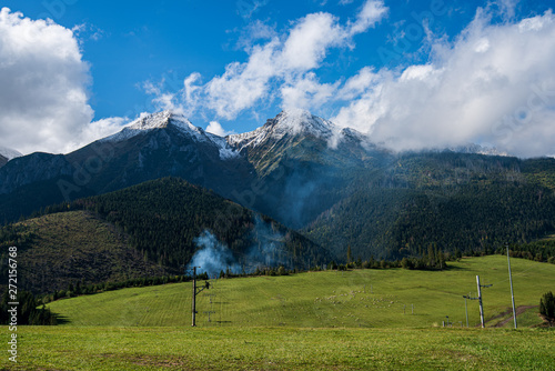 panoramic view of tatra mountains in slovakia in sunny day with blue sky