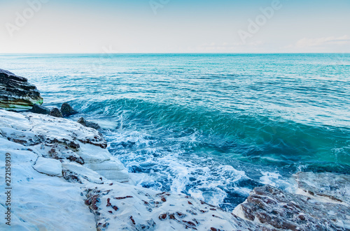 White rocks by the sea. Sea coast, waves. Rest by the sea.