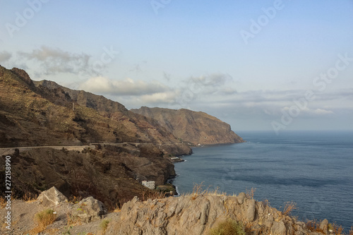 Las Gaviotas cliffs of the Anaga mountains partly covered by clouds. Santa Cruz de Tenerife, Canary Islands.
