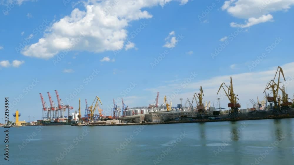 Marine port cranes, and industrial zone in cargo front of Odessa sea commercial port in Ukraine. Logistic freight center. Marine port cranes, and industrial zone in cargo front of Odessa sea commercial port in Ukraine. Logistic freight center.