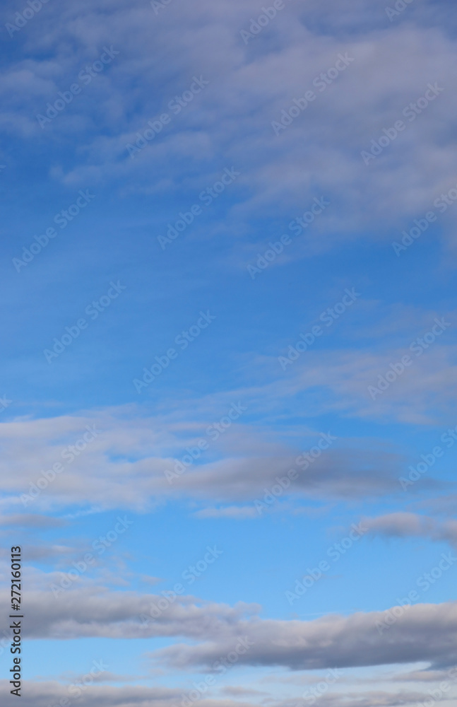 Vertical blue sky and many clouds Vertical blue sky and many clouds