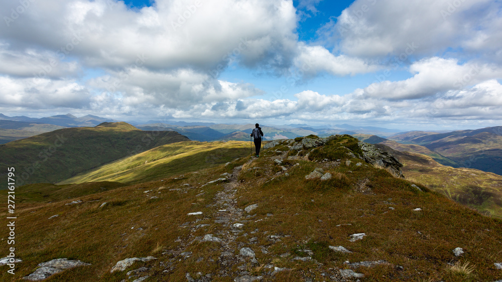 Young girl exploring the beautiful highlands of Scotland.