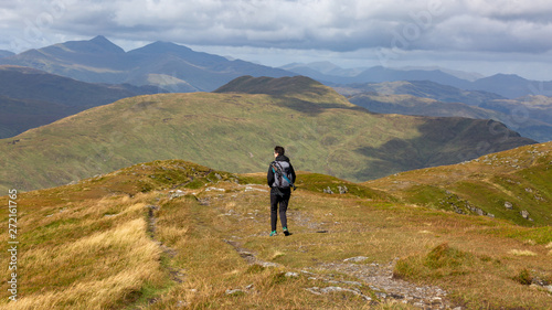 Young girl exploring the beautiful highlands of Scotland.