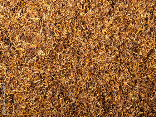 Obraz na płótnie Tobacco texture. High quality dry cut tobacco big leaf, close up, background w salonie