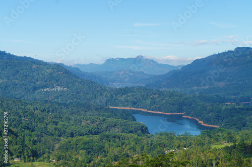 Mountain green landscape with beautiful views of the tropical island of Sri Lanka in summer.