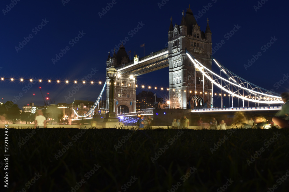 Obraz premium Tower Bridge in London, the UK. Sunset with beautiful clouds. Drawbridge opening. One of English symbols