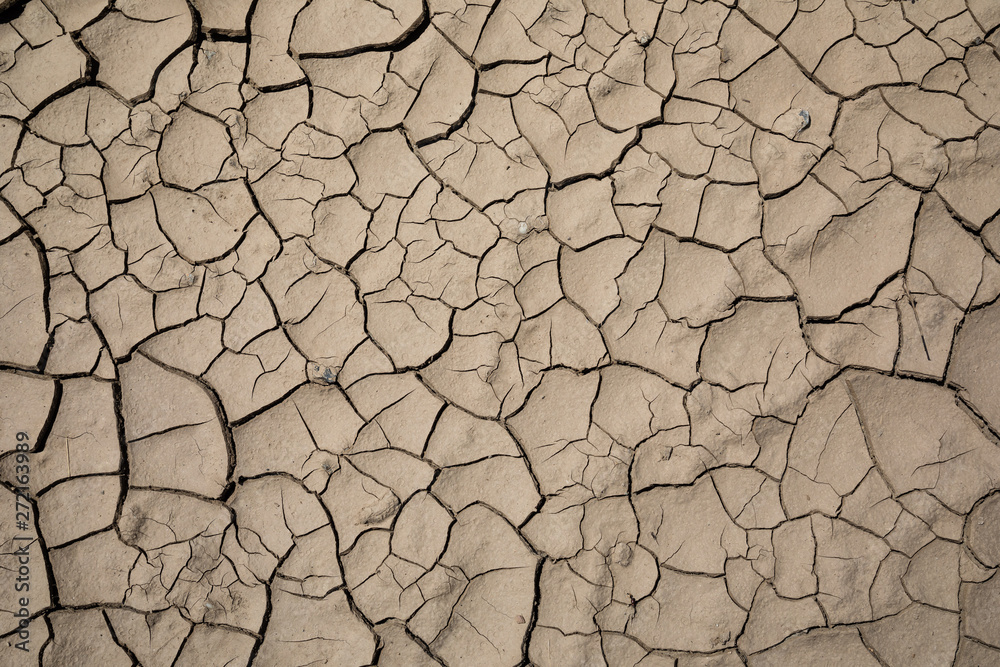 Detail of a cracked dry soil in water shortage time Detail of a cracked dry soil in water shortage time