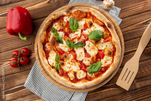 Flyer and poster for Restaurants or pizzerias, template with delicious taste margarita pizza, mozzarella cheese, cherry tomatoes.