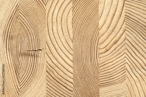 Fényképezés Cross-section of glued wooden timber of pine.