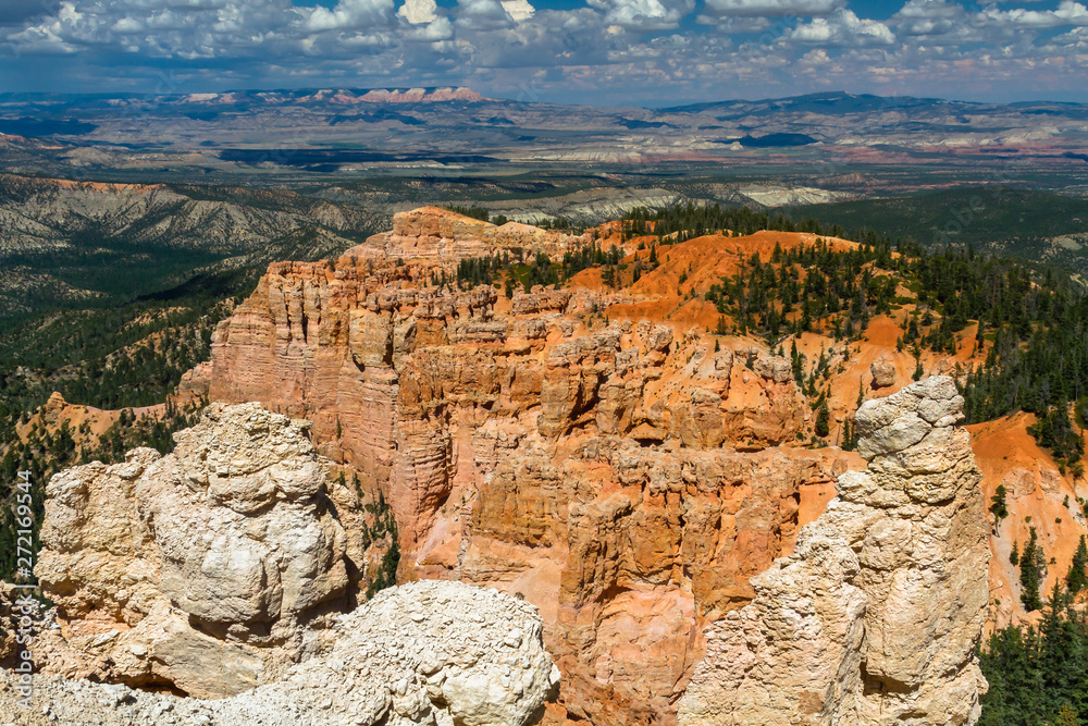 Bryce Canyon view with colorful rocks, skies and distance