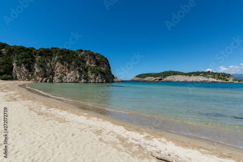 Voidokilia Beach, popular white sand and blue clear water beach in Messinia in Mediterranean area in shape of Greek letter omega, Peloponnese, Greece.