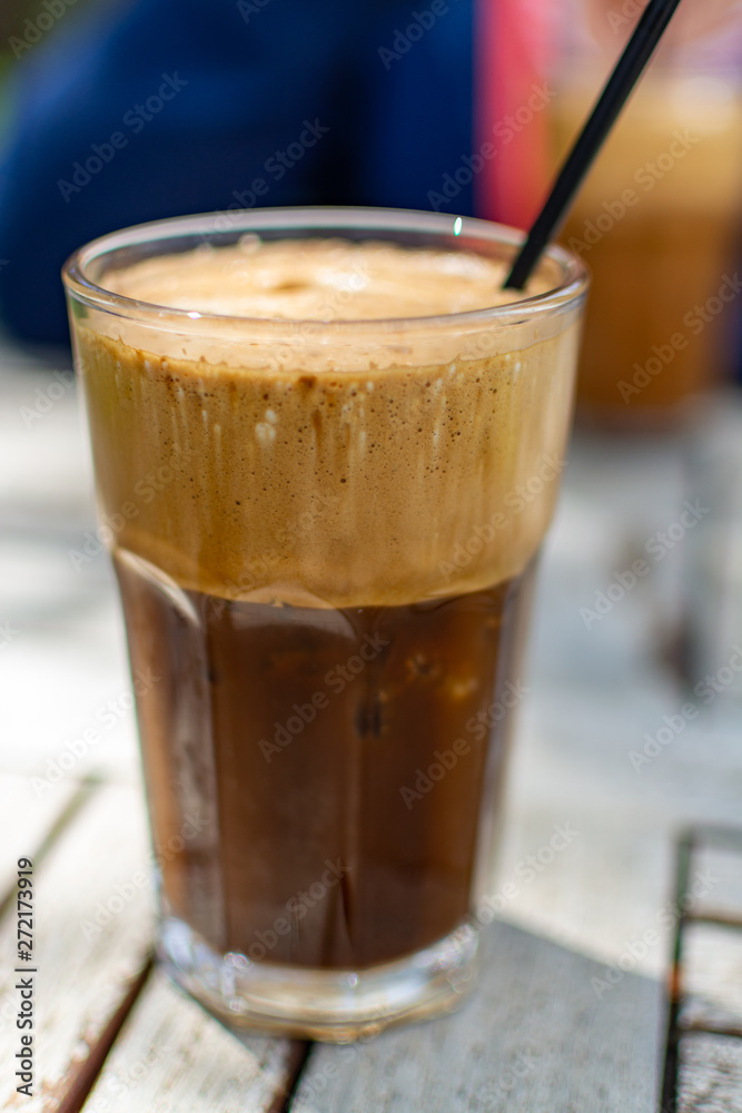 Traditional greek cold coffee Frappe made from water, instant coffee and ice cubes Traditional greek cold coffee Frappe made from water, instant coffee and ice cubes