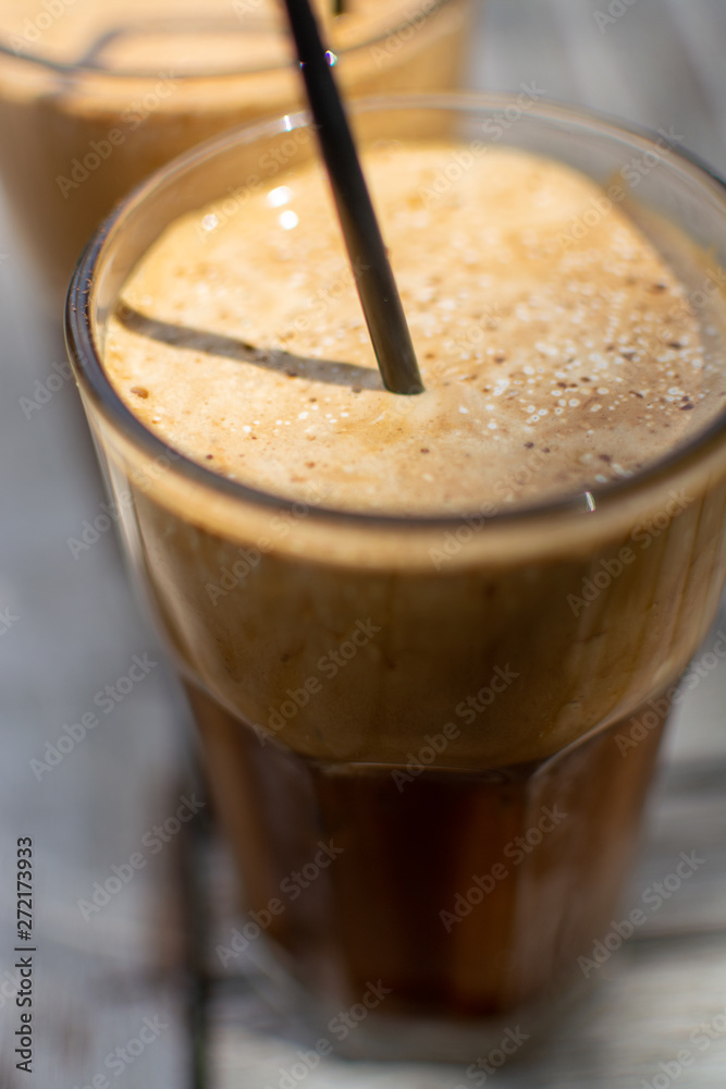 Traditional greek cold coffee Frappe made from water, instant coffee and ice cubes Traditional greek cold coffee Frappe made from water, instant coffee and ice cubes