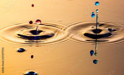 Two collision effect of two falling water drops - Drop Sculpture. photo