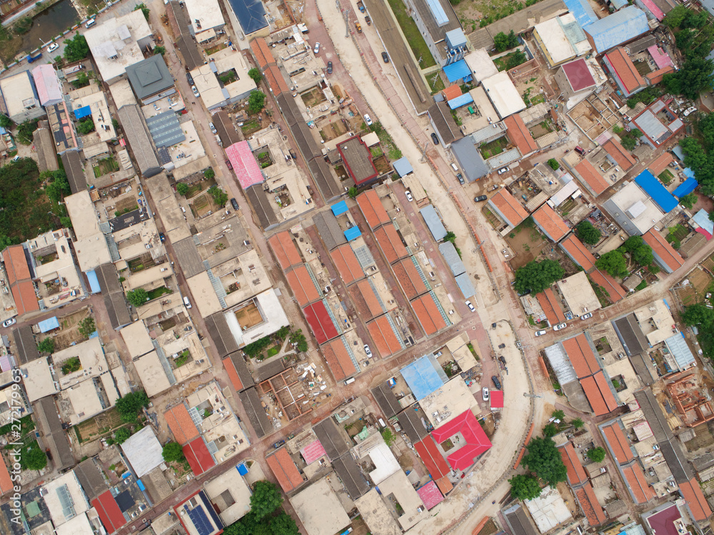 Aerial view top view of small village with little courtyard and farm style house in the country side area of Huaibei next the mountain, China Aerial view top view of small village with little courtyard and farm style house in the country side area of Huaibei next the mountain, China