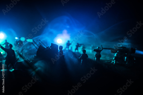 War Concept. Military silhouettes fighting scene on war fog sky background 