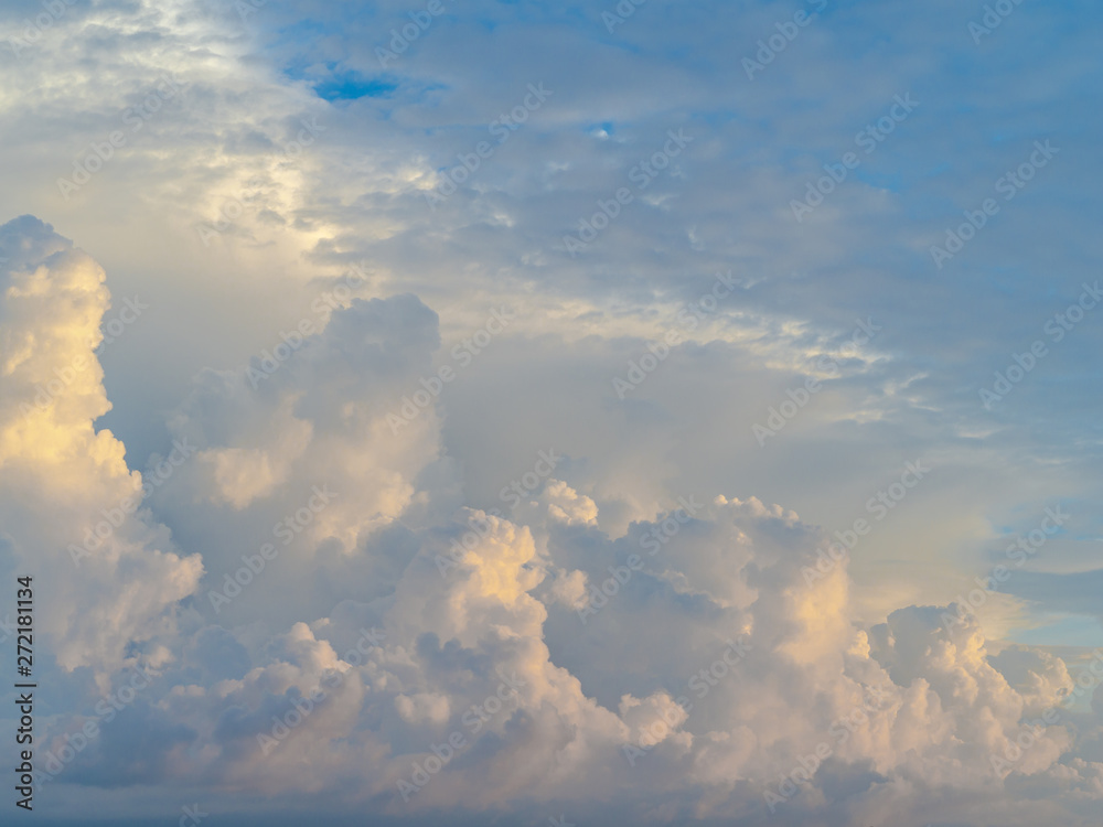 Blue sky background with clouds and sunlight. Blue sky background with clouds and sunlight.