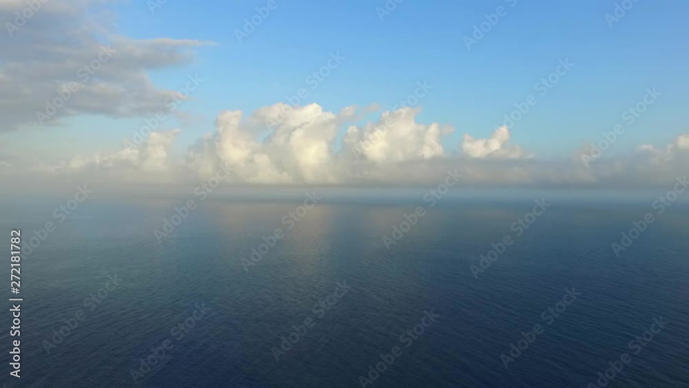 4k Ocean view in the Caribbean sea. Central Coast of Venezuela. Sunny day of summer. Calm waters. Aerial view. Beautiful clouds. 4k Ocean view in the Caribbean sea. Central Coast of Venezuela. Sunny day of summer. Calm waters. Aerial view. Beautiful clouds.