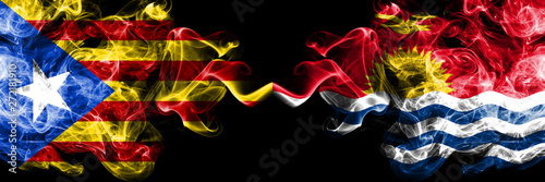 Catalonia vs Kiribati smoke flags placed side by side. Thick colored silky smoke flags of Catalonia and Kiribati