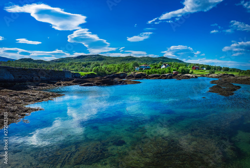 Picturesque panoramic view of Godoy Island in Giske Municipality in More og Romsdal county, Norway. Norwegian sea bay in summer scenery