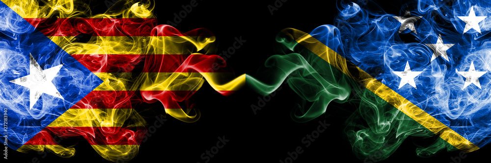 Fototapeta Catalonia vs Solomon Islands smoke flags placed side by side. Thick colored silky smoke flags of Catalonia and Solomon Islands
