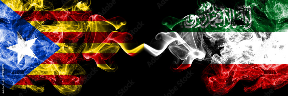 Fototapeta Catalonia vs Somaliland smoke flags placed side by side. Thick colored silky smoke flags of Catalonia and Somaliland