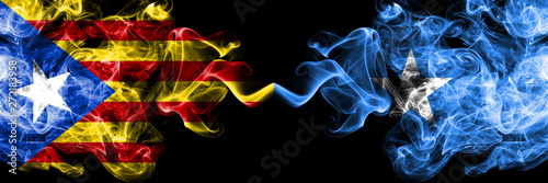 Catalonia vs Somalia, Somalian smoke flags placed side by side. Thick colored silky smoke flags of Catalonia and Somalia, Somalian photo