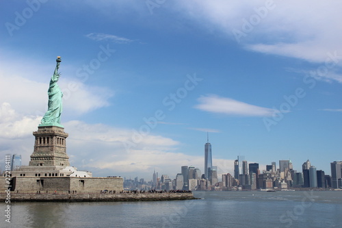 Statue of Liberty with Manhattan View on the Background