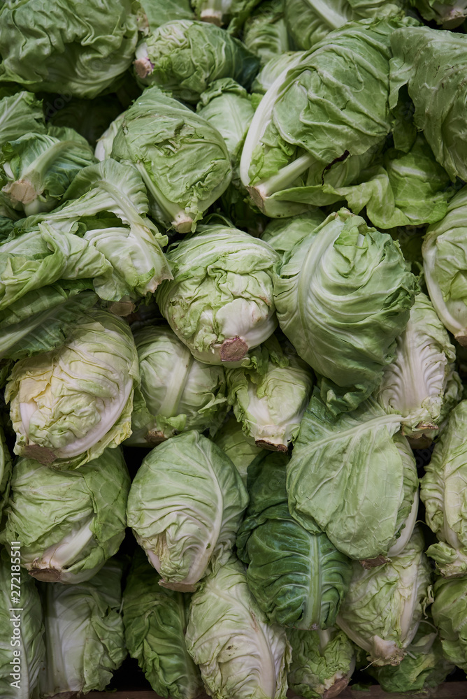 Cabbage vegetable background, close-up. Raw cabbage in market, top view Cabbage vegetable background, close-up. Raw cabbage in market, top view