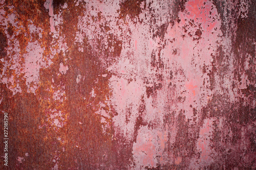 Abstract grunge background: red rusty wall with stains and scratches