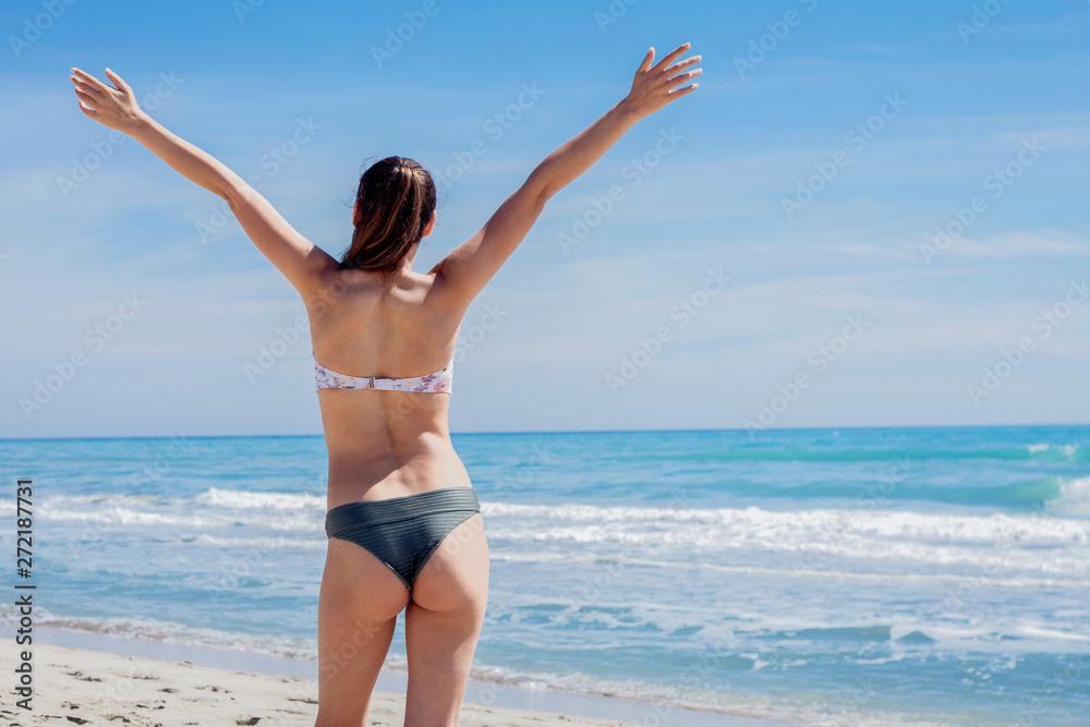 beautiful young woman at the beach beautiful young woman at the beach